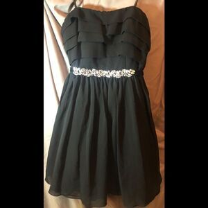 💥City studio baby doll black dress with tie in back & underlay.